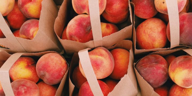 Bags full of Peaches in the Garden