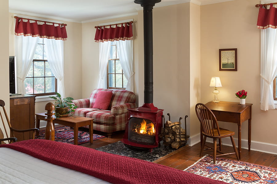 Red room bed and wood stove