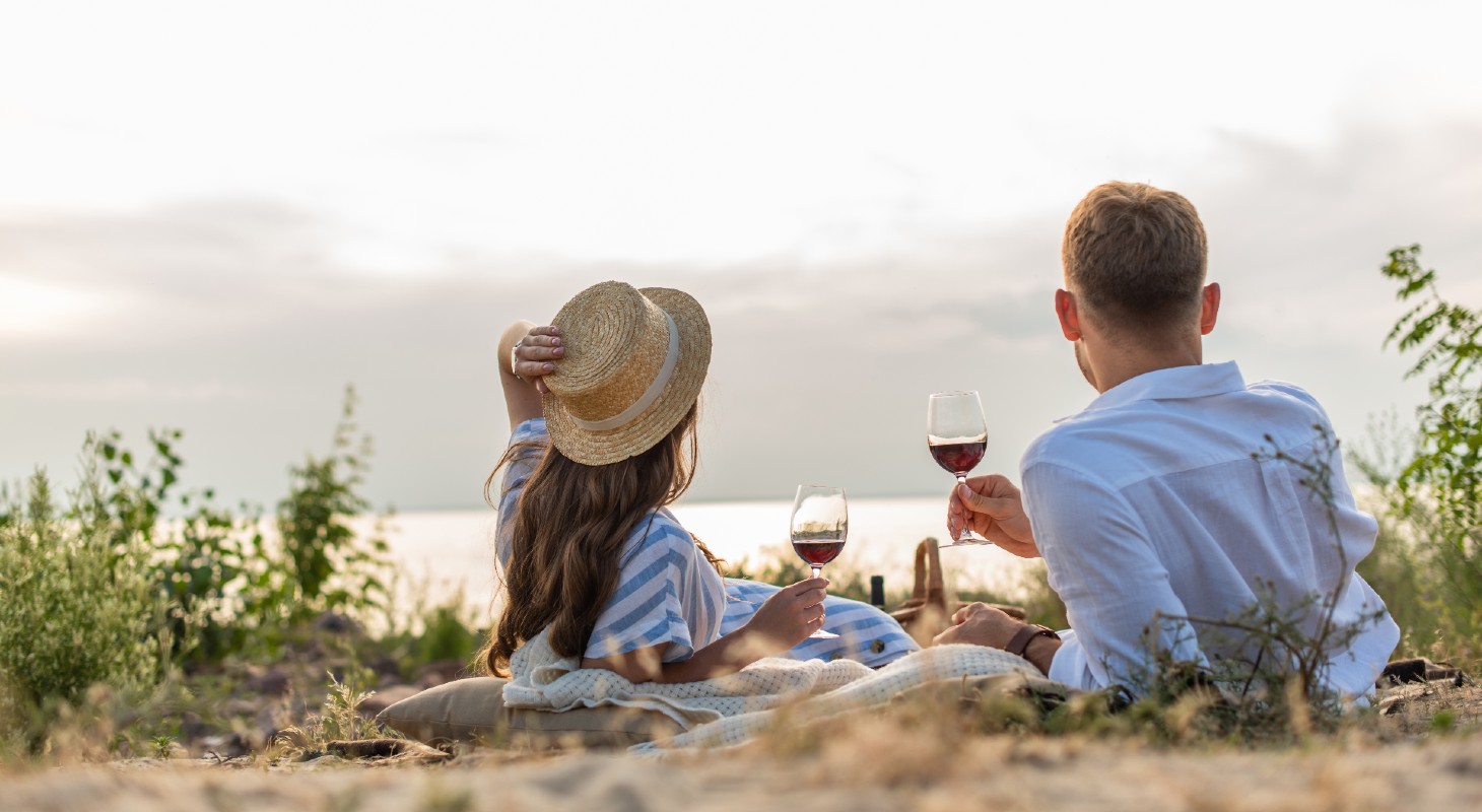 Couple enjoying wine on the beach in Maryland