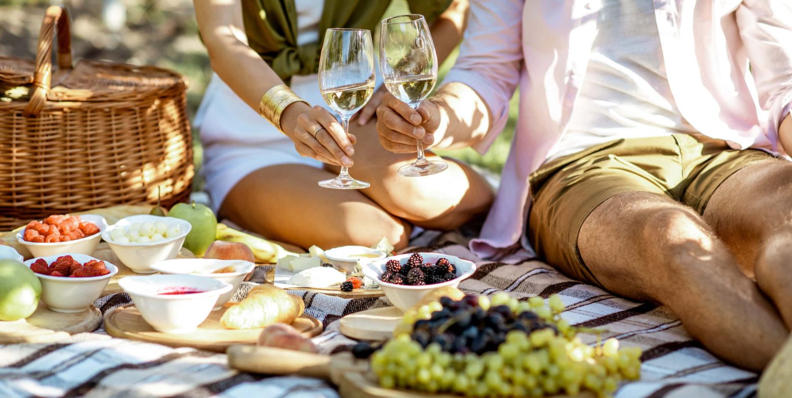 Couple enjoying a romantic picnic outdoors