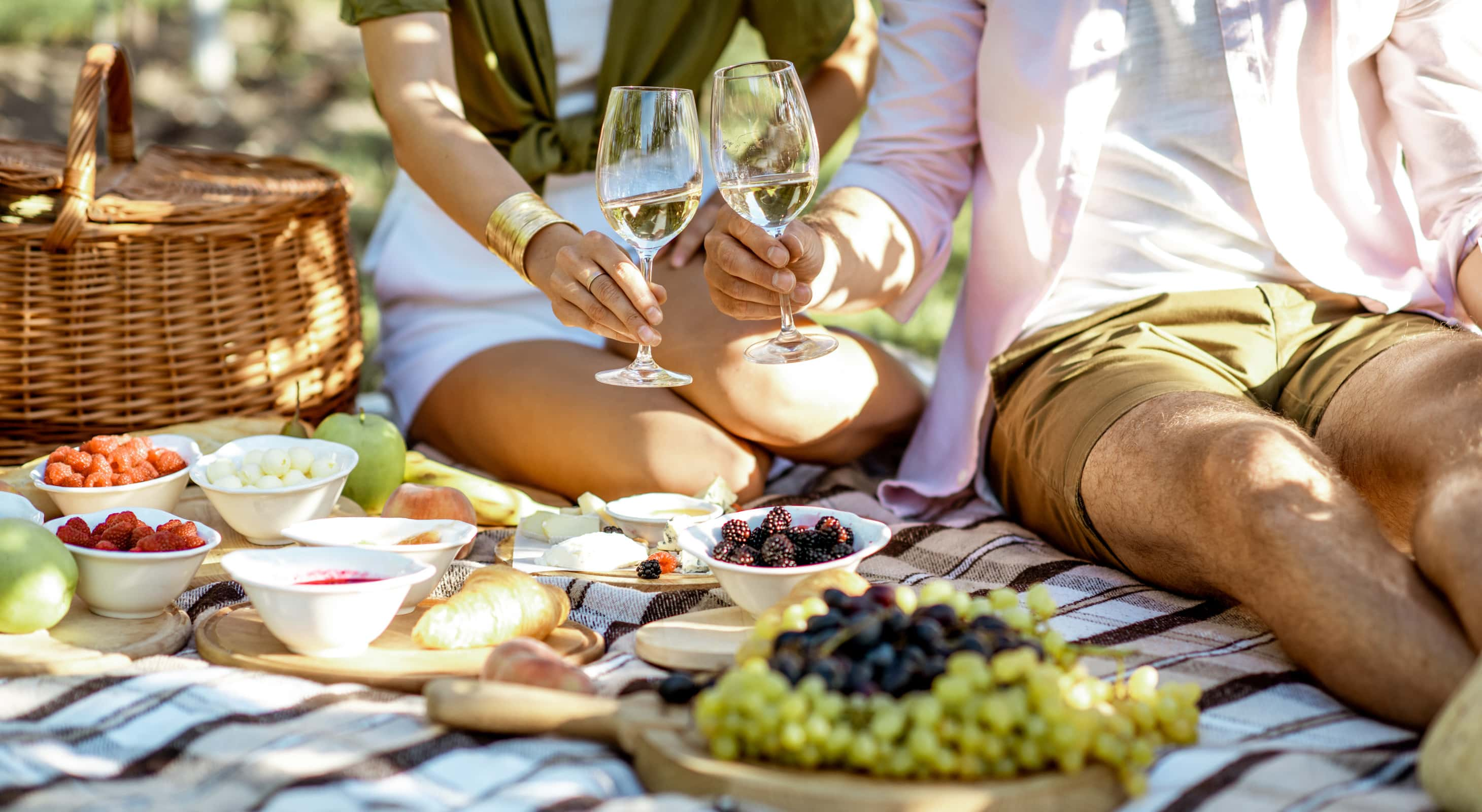 Couple enjoying a romantic picnic outdoors